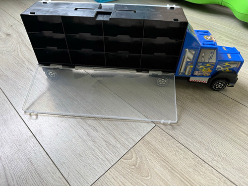 Blue black plastic toy - &,